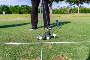 Ball Striking, Breaking 90, John Hughes Golf, Best Golf Schools in Orlando, Ball Position, Alignment Sticks